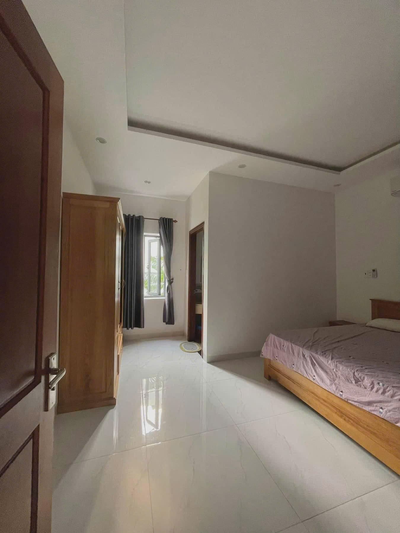 Nhà nguyên căn 4 tầng diện tích 100m2 tại Nghiêm Xuân Yêm, có 6 phòng ngủ và phòng thờ vào ở ngay - Ảnh 2